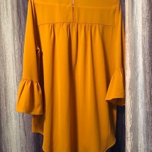 Never worn bell sleeve top!